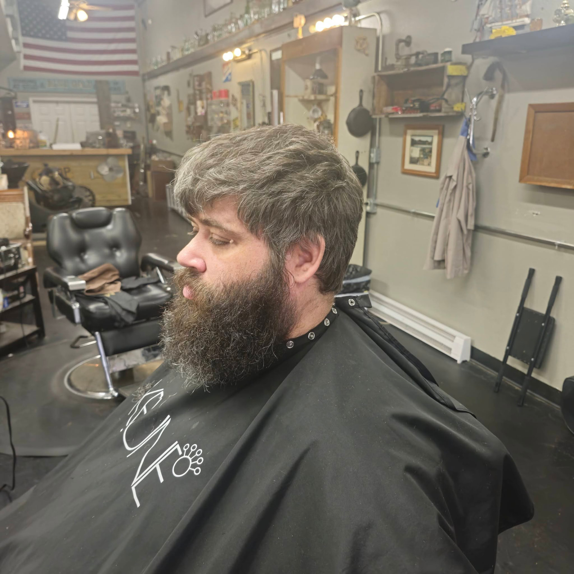 Client before a haircut and beard trim